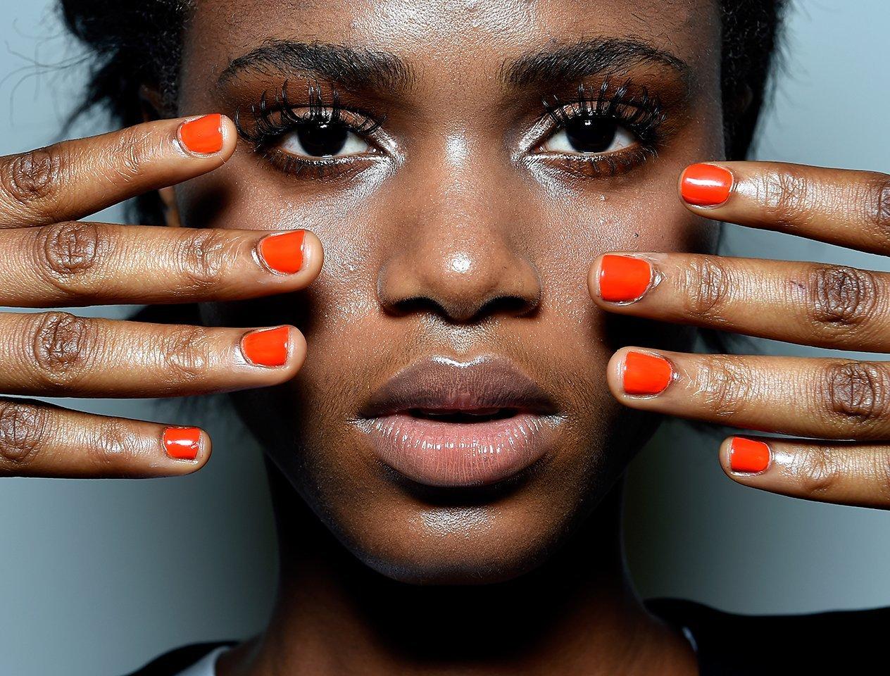 Model with red nails