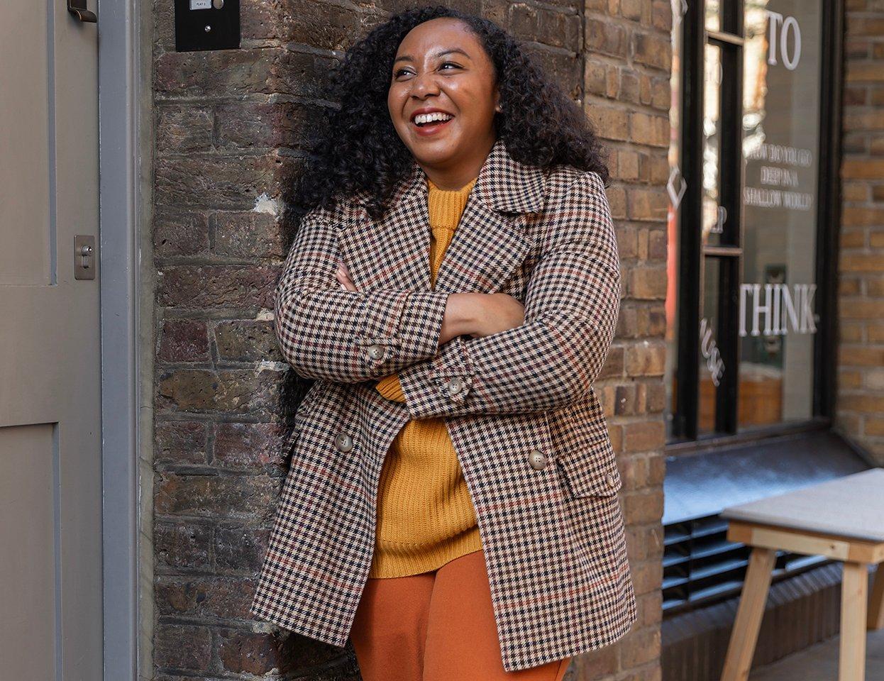 Nicole Ocran in a John Lewis & Partners checked pea coat